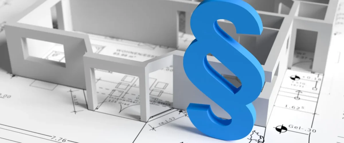 3d Bauplan auf dem Tisch. Bei der Hausbauplanung müssen die Bauvorschriften berücksichtigt werden